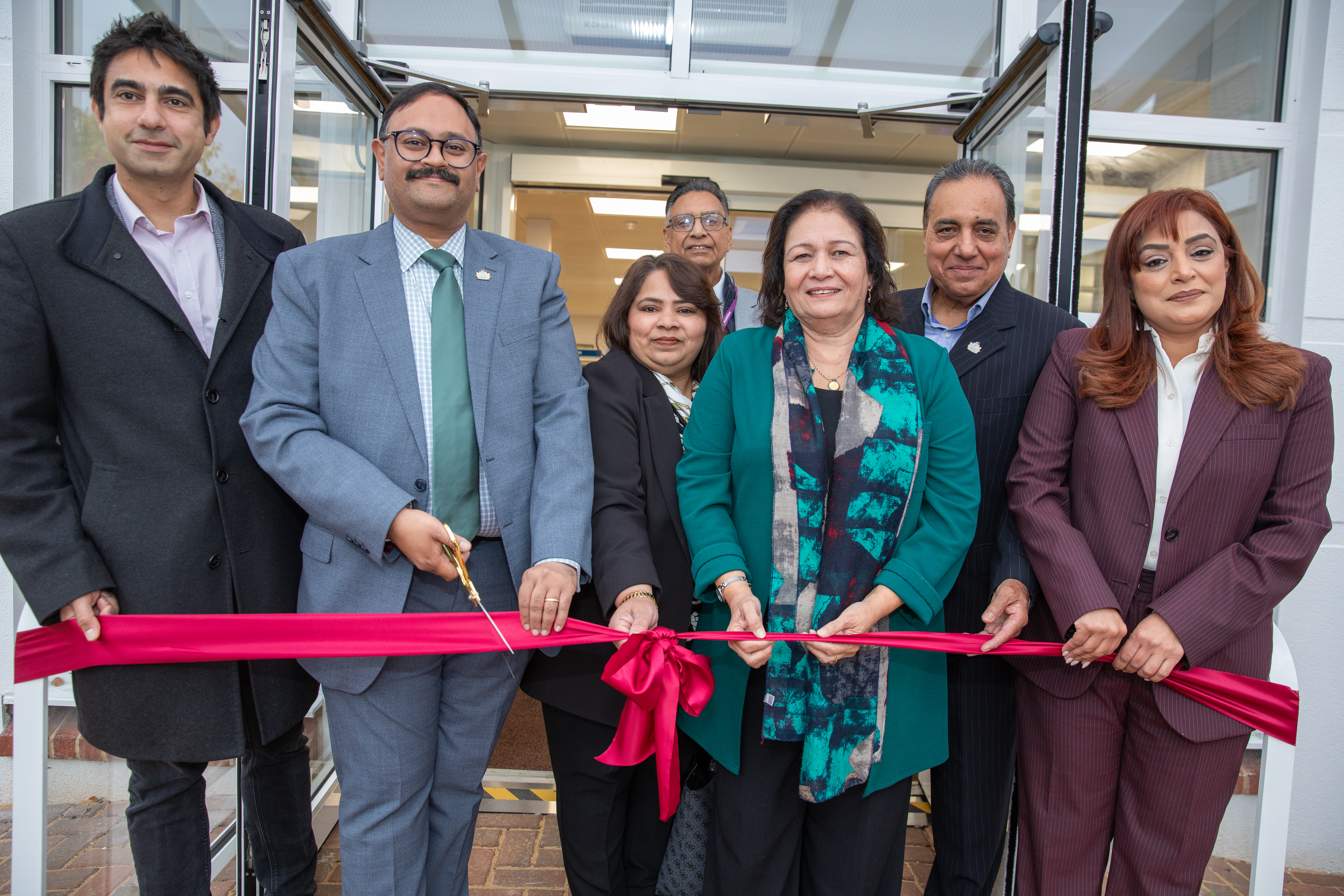Council leader Shantanu Rajawat cuts ribbon to open the new hub with cabinet members